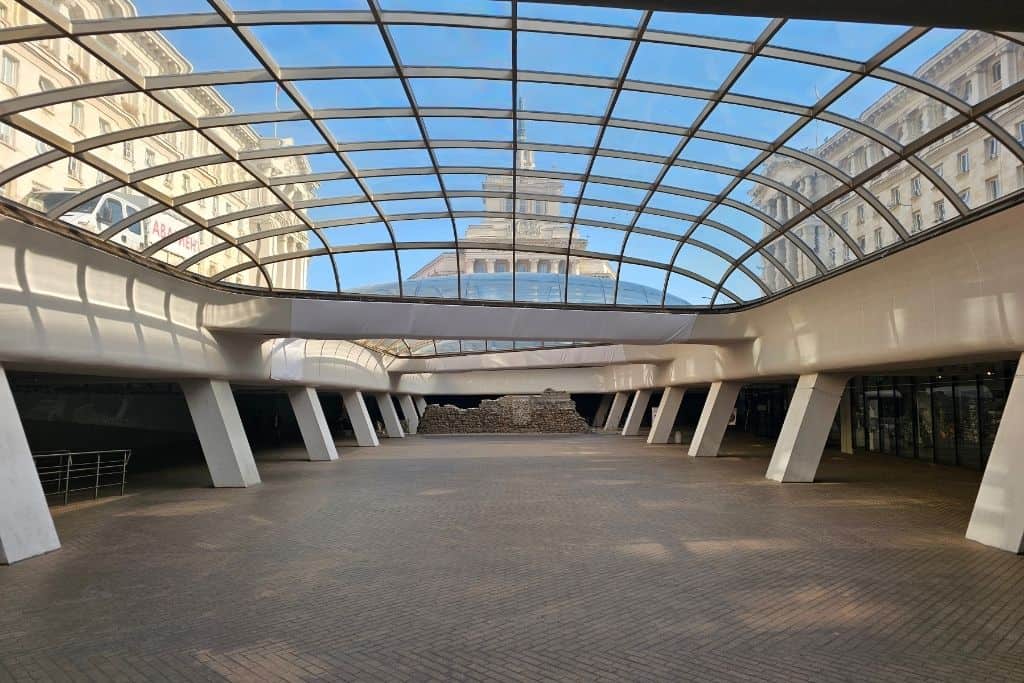 Glass-roofed structure over ancient Roman ruins in the Largo area, one of the most fascinating places to walk through in Sofia’s historic city center.